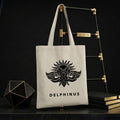 Tote bag L'AUTHENTIQUE DELPHINUS — coloris naturel, logo cigale noir — tote bag suspendu  l'echelle noir et or